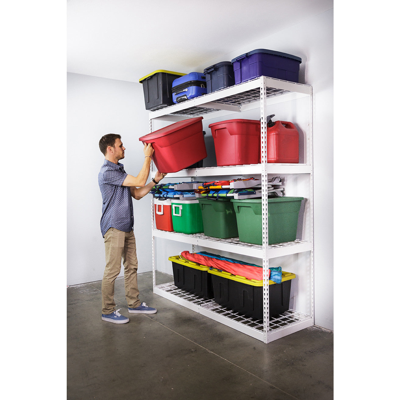 person removing red bin from white garage shelf