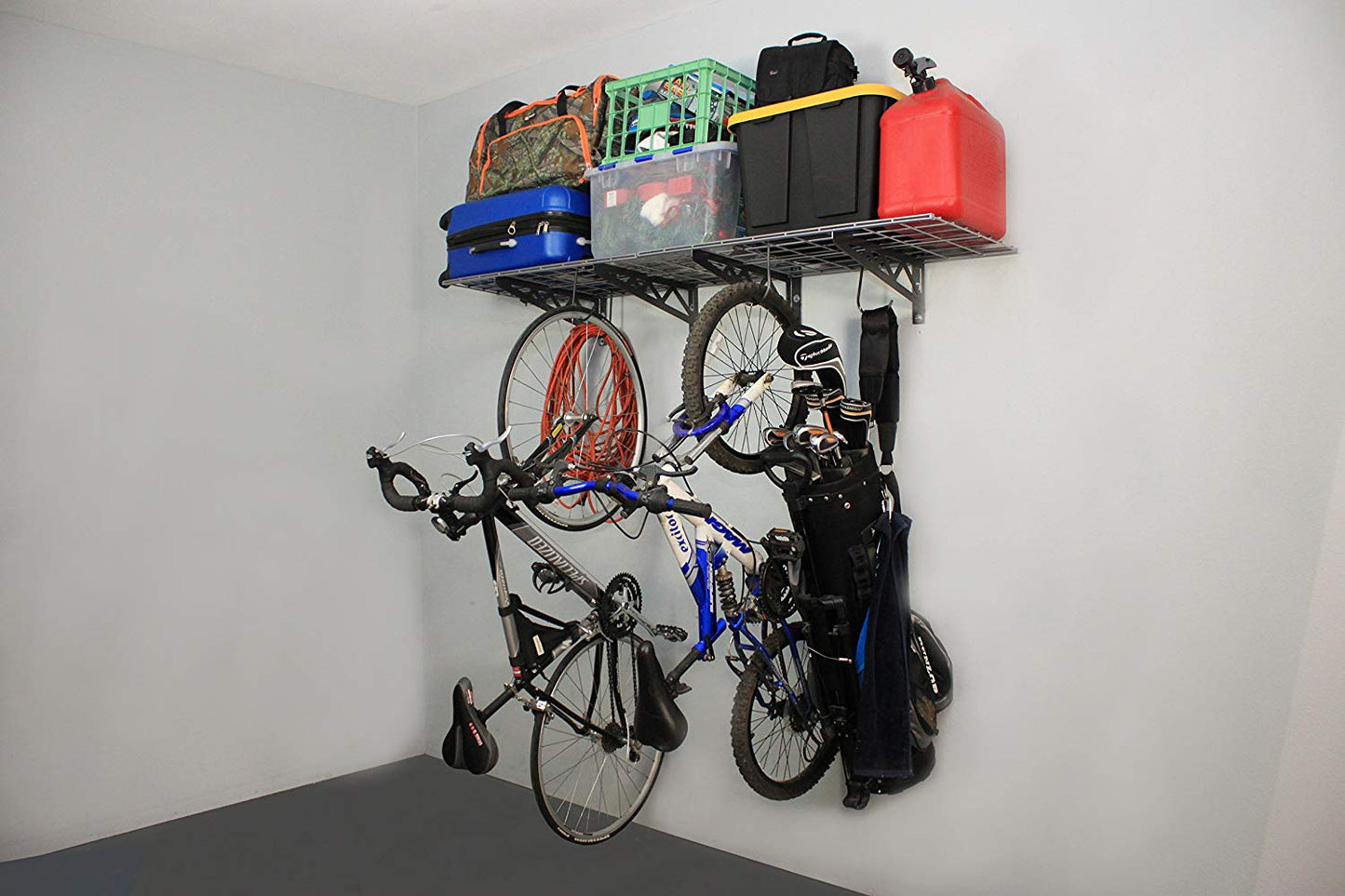 gray wall shelves with bins and bicycles